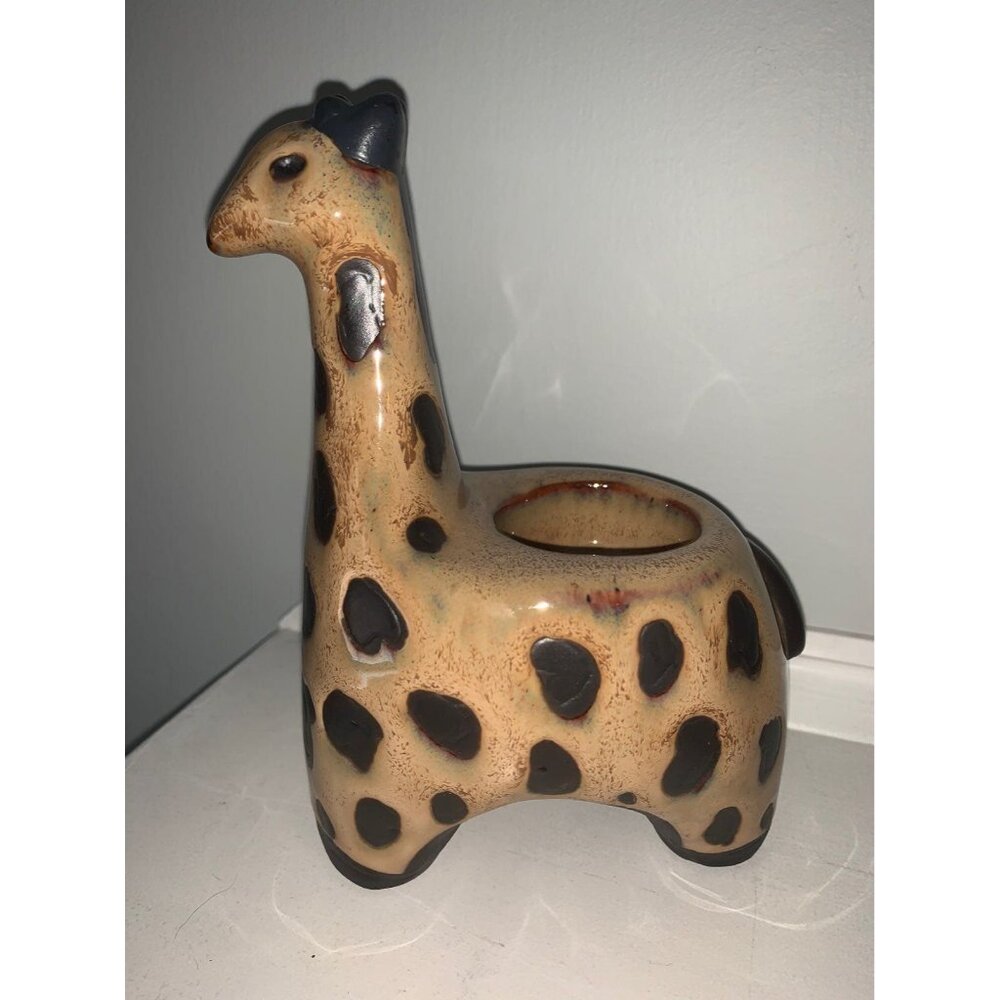 Ceramic Giraffe-Shaped figurine candle holder.
